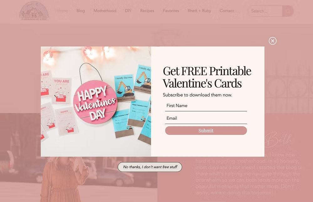Pop-up offering free printable Valentine’s cards with a subscription form overlaying a craft-themed background.
