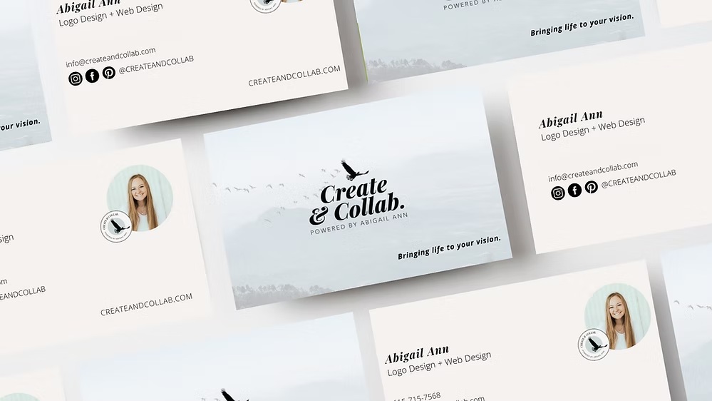 Multiple Create & Collab business cards arranged in an overlapping layout showing front and back designs with mountain landscape branding.