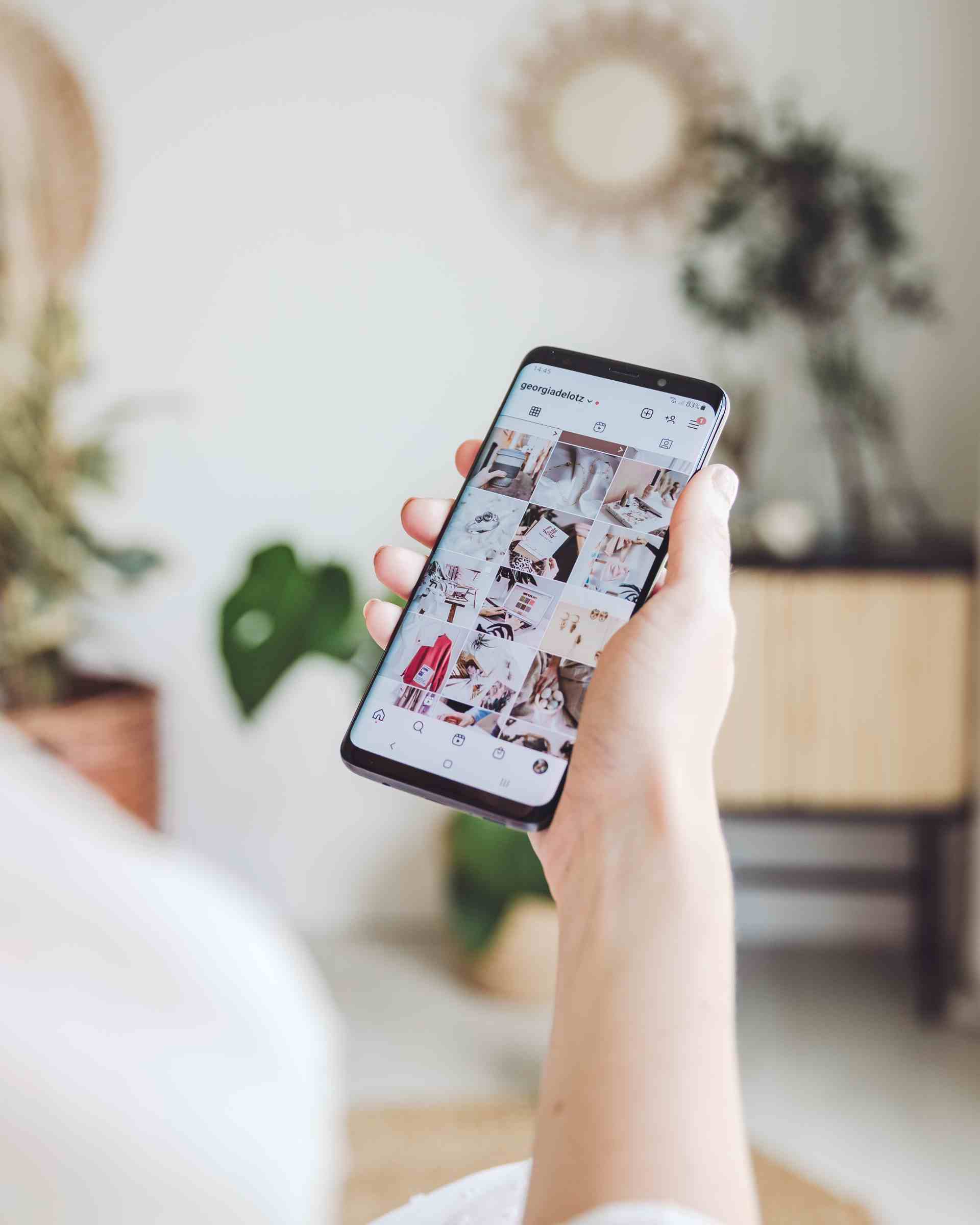 Smartphone showing Instagram profile grid